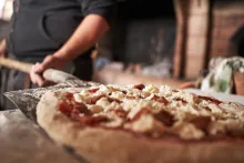 La marca era reconocida por su variedad de pizzas.